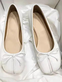 Ballerines noires pour femmes ballerines plates à nœud décoratif sur les orteils