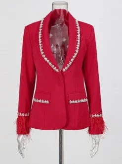 Blazer femme à revers cranté et poignets en plumes orné de strass col à un bouton coupe cintrée.