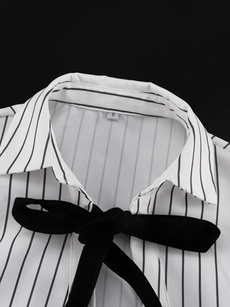 Blouse blanche pour femme col rabattu manches longues style décontracté avec nœuds.