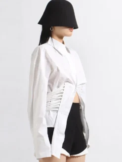 Blouse noire pour femme col rabattu boutons chics lacets manches longues