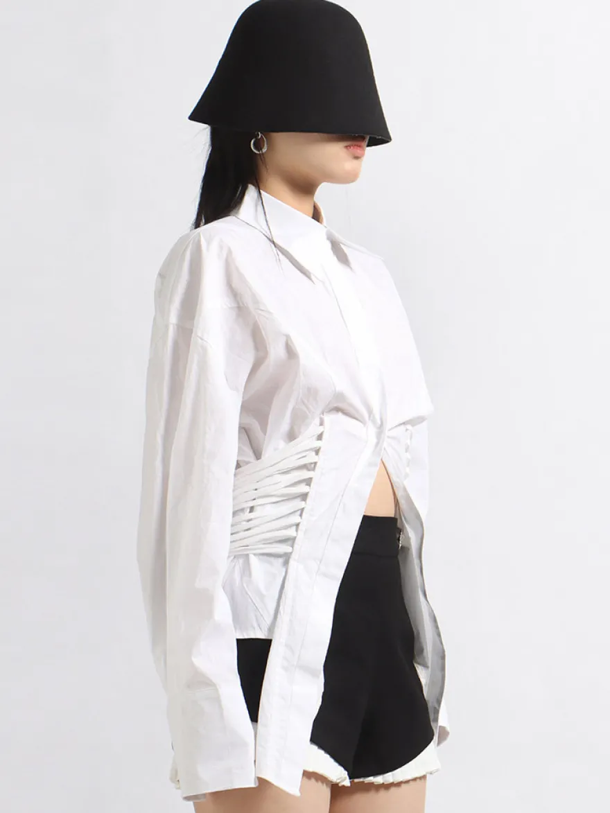 Blouse noire pour femme col rabattu boutons chics lacets manches longues