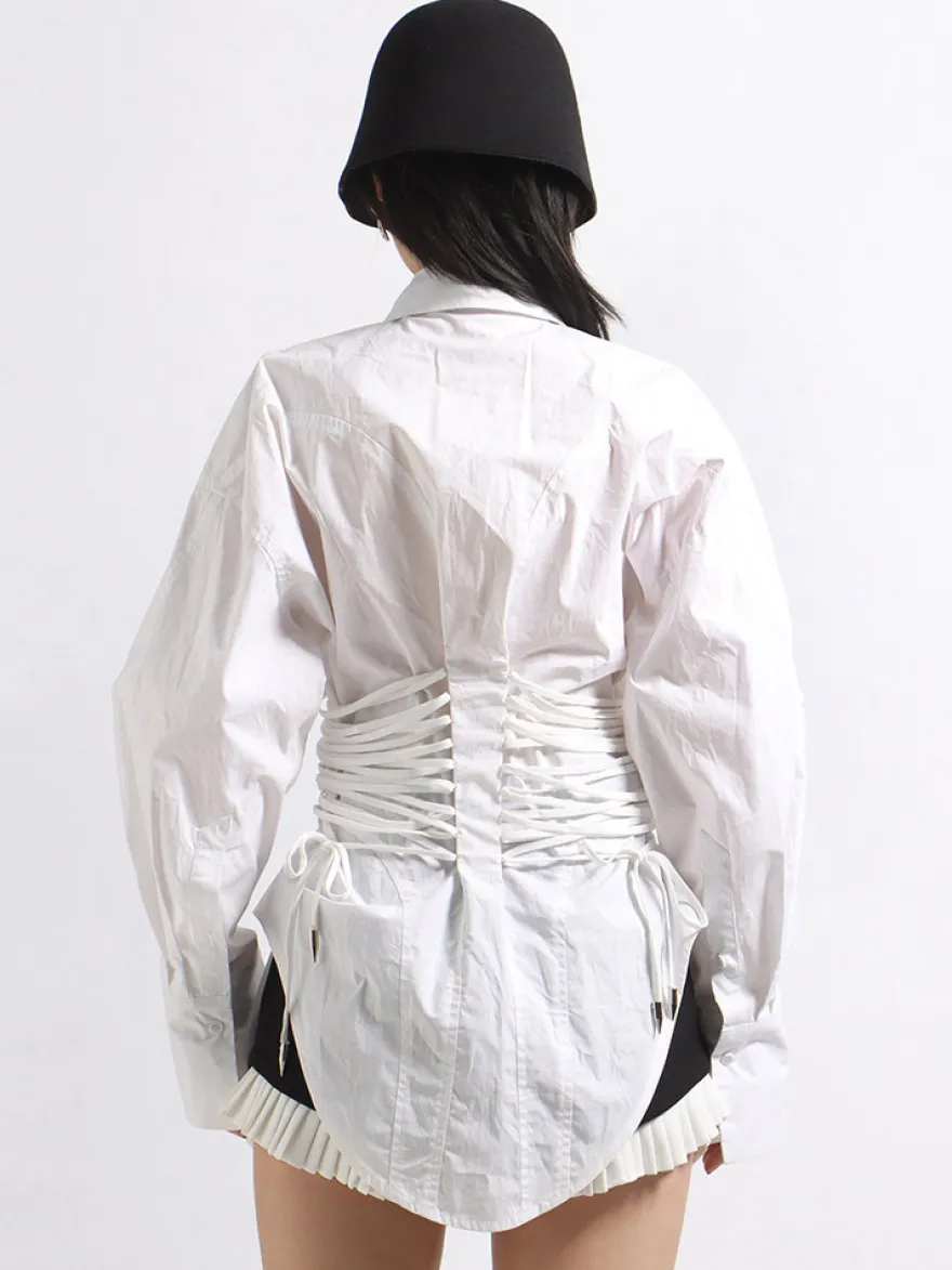 Blouse noire pour femme col rabattu boutons chics lacets manches longues