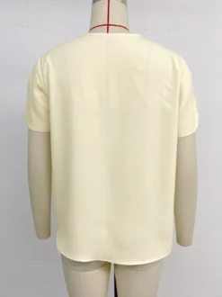 Blouse pour femme abricot col en V manches courtes style décontracté idéale pour l'été