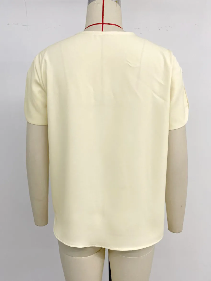 Blouse pour femme abricot col en V manches courtes style décontracté idéale pour l'été