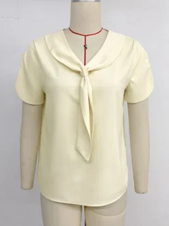 Blouse pour femme abricot col en V manches courtes style décontracté idéale pour l'été