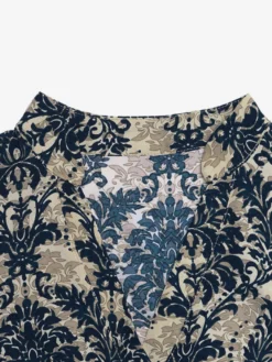 Blouse pour femme bleu foncé imprimée à col montant chic sans manches