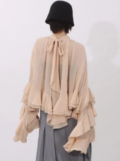 Blouse pour femme couleur saumon à volants plissée col montant manches longues chic