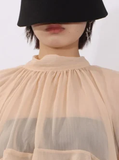 Blouse pour femme couleur saumon à volants plissée col montant manches longues chic