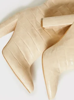 Bottes cuissardes larges pour femmes à talon épais et à motif pierre style oversize