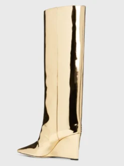 Bottes hautes dorées à bout pointu et talons compensés