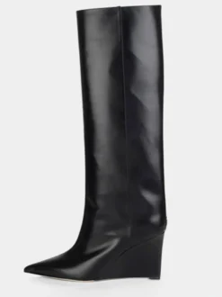 Bottes hautes dorées à bout pointu et talons compensés