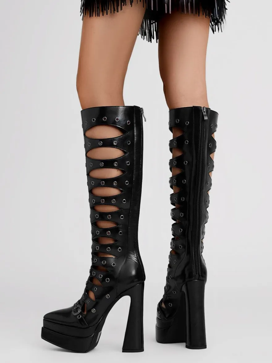 Bottes hautes à plateforme et bout pointu avec découpes et talons hauts