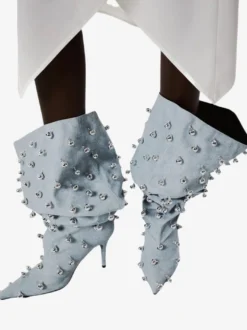 Bottes noires montantes à bout pointu et talons hauts perlés pour femmes