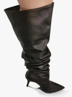 Bottes noires souples à talons hauts et bout pointu