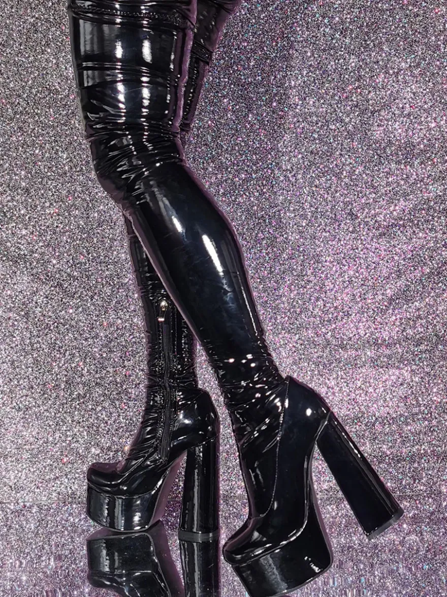 Bottes sexy au-dessus du genou à plateforme et à talons hauts