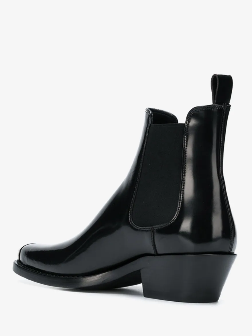 Bottines Chelsea noires pour homme bout carré détails métalliques talon épais