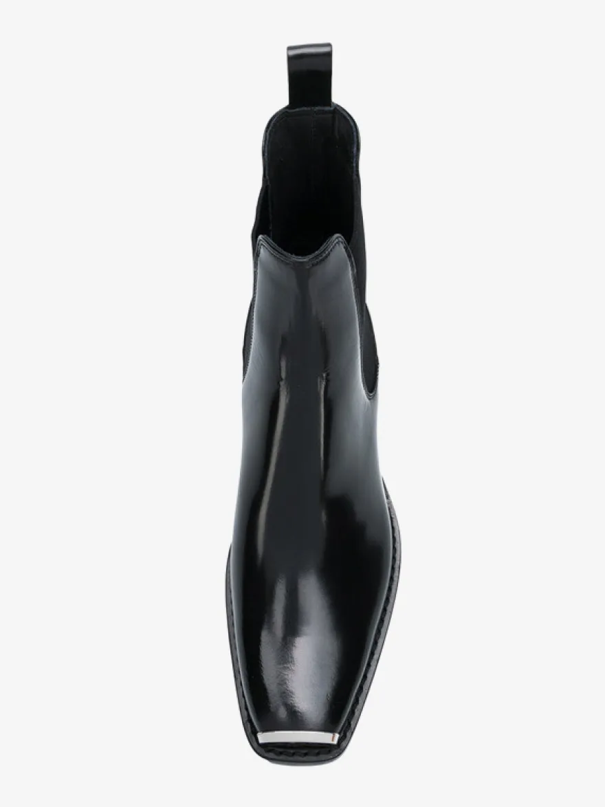 Bottines Chelsea noires pour homme bout carré détails métalliques talon épais