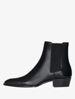 Bottines Chelsea pour homme en cuir véritable bout rond à enfiler et talon épais.