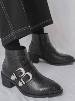 Bottines noires à bout pointu motif serpent et boucle