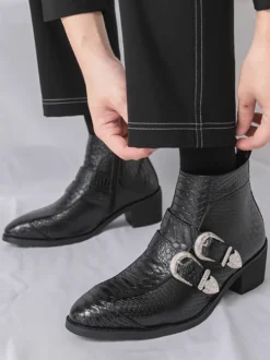 Bottines noires à bout pointu motif serpent et boucle