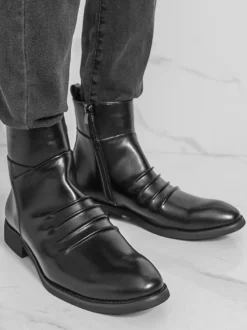 Bottines noires plates à bout rond et fermeture éclair pour homme