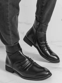 Bottines noires plates à bout rond et fermeture éclair pour homme