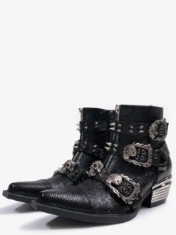 Bottines pour homme noires à bout pointu et talon épais ornées d'une boucle métallique