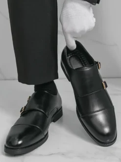 Chaussures à boucle noires à bout rond et détail de boucle chaussures décontractées