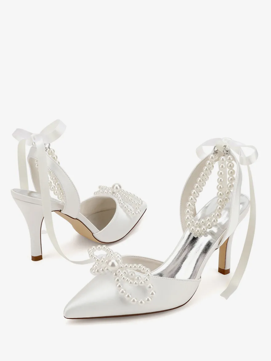 Chaussures de mariage ivoire en satin à bout pointu avec perles et nœud à talons hauts