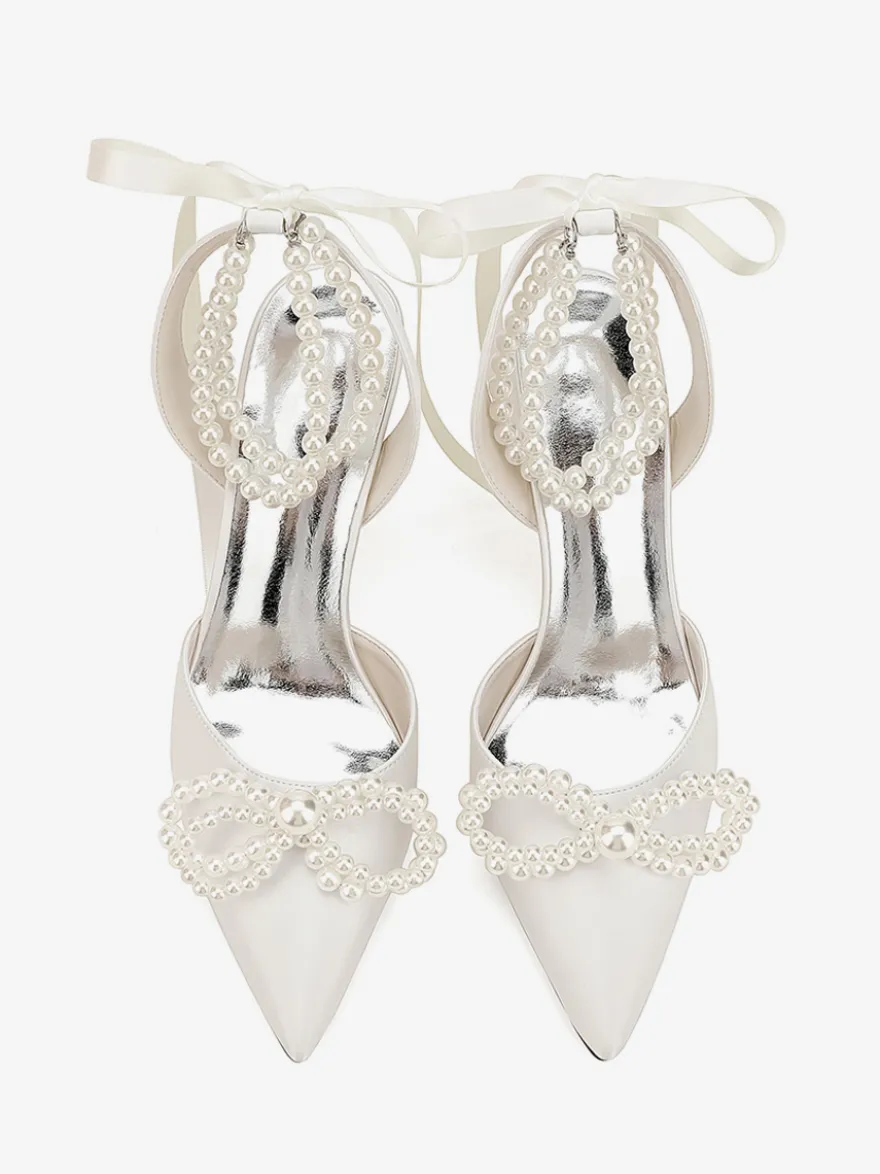Chaussures de mariage ivoire en satin à bout pointu avec perles et nœud à talons hauts