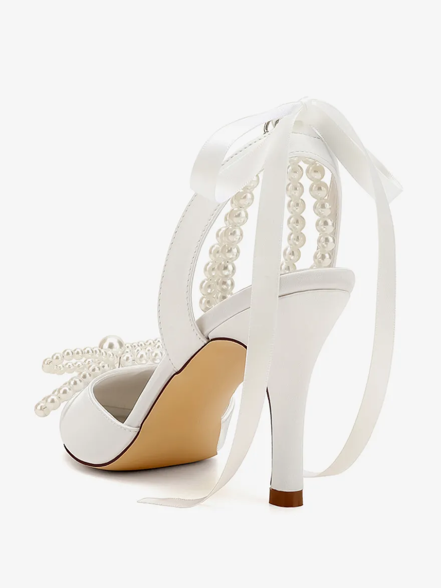Chaussures de mariage ivoire en satin à bout pointu avec perles et nœud à talons hauts