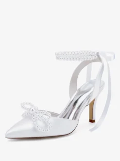 Chaussures de mariage ivoire en satin à bout pointu avec perles et nœud à talons hauts