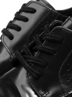 Chaussures de ville pour hommes style brogue bout rond lacets en cuir véritable.