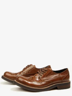 Chaussures de ville pour hommes style brogue bout rond lacets en cuir véritable.