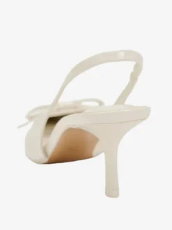 Chaussures habillées noires à talons hauts avec nœuds et bride arrière à talons aiguilles