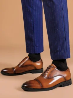 Chaussures habillées pour hommes en cuir à bout pointu à lacets et à talons bas derbies