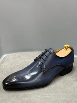Chaussures habillées pour hommes modernes à bout rond en cuir de vache