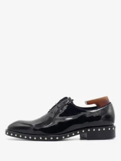 Chaussures habillées pour hommes à la mode à bout rond et rivets en cuir de vache