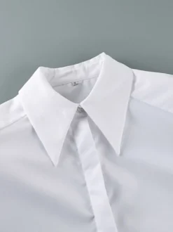 Chemise habillée à manches longues col pointu oversize et poignets larges
