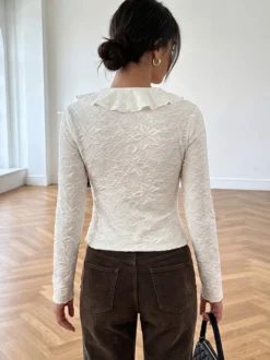 Chemisier court à manches longues texturé col en V à volants et nœud sur le devant coupe ajustée pour femme