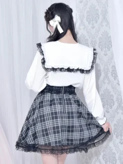 Chemisiers gothiques Lolita haut Lolita blanc à manches longues nœuds en dentelle chemise Lolita à blocs de couleurs