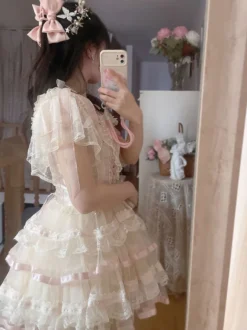 Chemisiers Lolita doux haut Lolita blanc à manches courtes nœuds et volants chemise Lolita