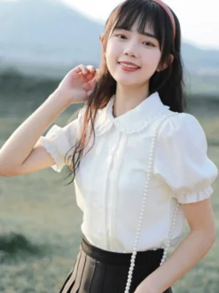 Chemisiers Lolita doux hauts Lolita blancs à manches courtes et volants chemise Lolita