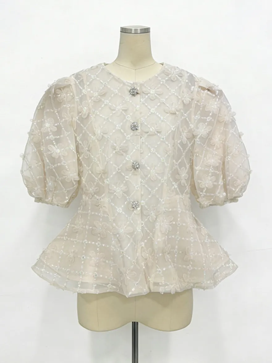 Chemisier transparent à col rond et imprimé floral 3D manches courtes bouffantes motif losanges fermeture boutonnée