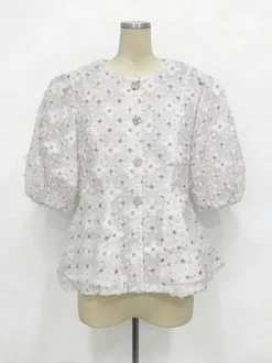 Chemisier transparent à col rond et imprimé floral 3D manches courtes bouffantes motif losanges fermeture boutonnée