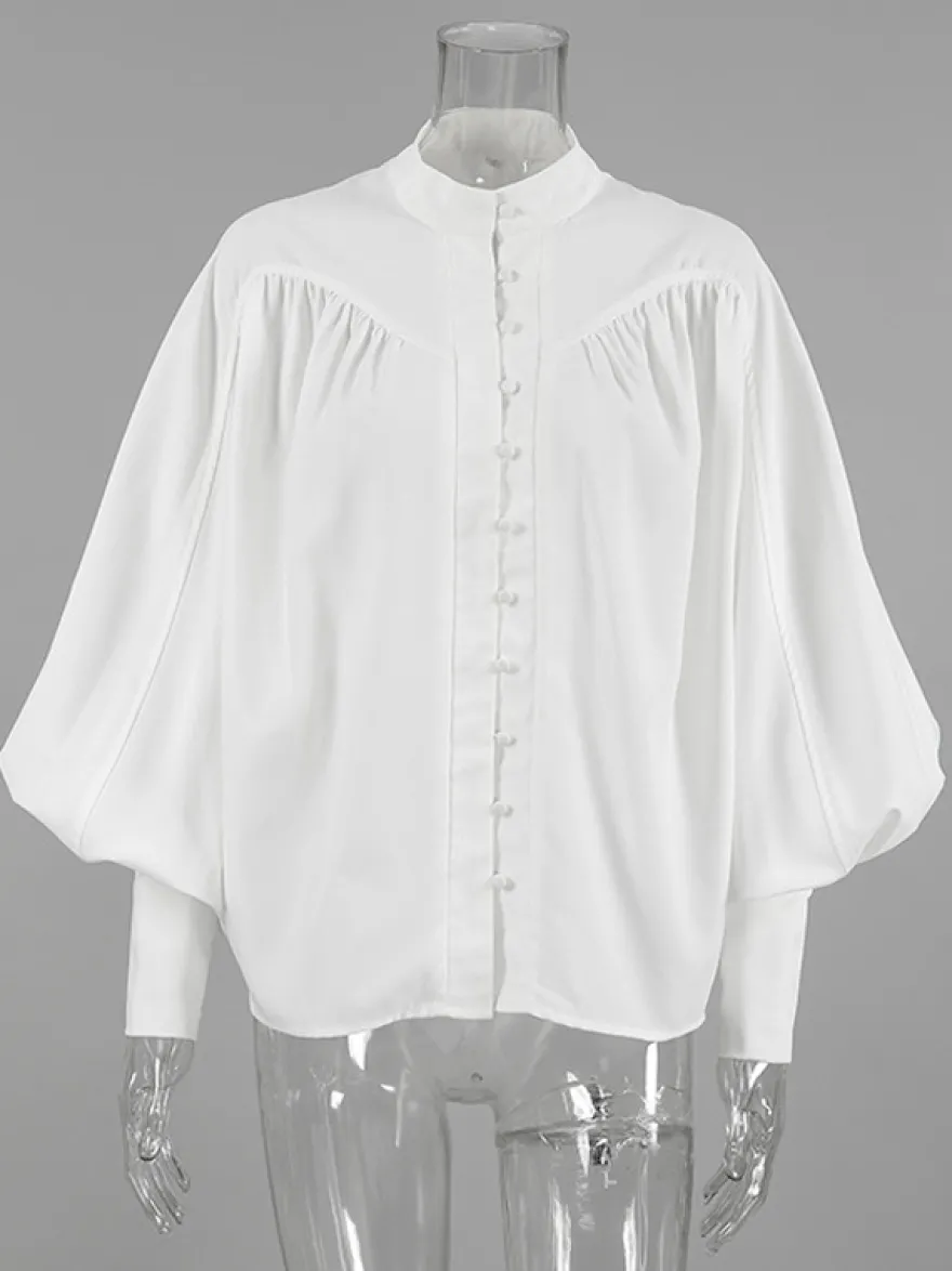 Chemisier vintage à manches bouffantes et col montant pour femme collection automne 2026