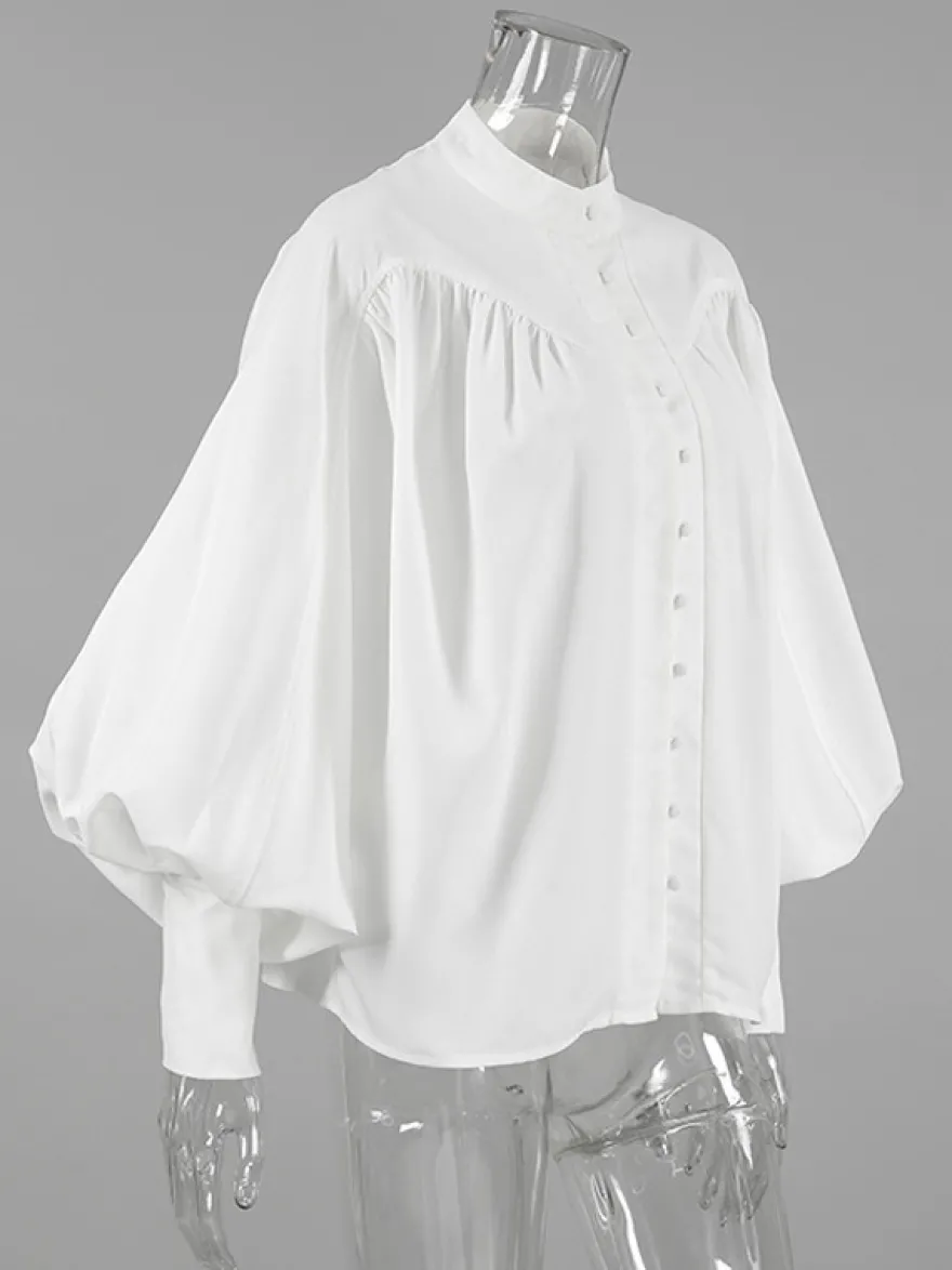 Chemisier vintage à manches bouffantes et col montant pour femme collection automne 2026