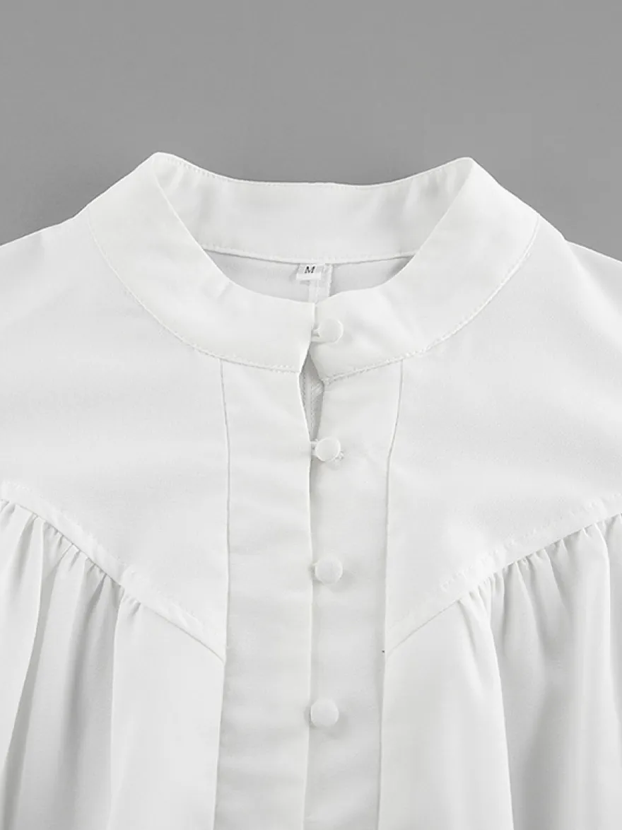 Chemisier vintage à manches bouffantes et col montant pour femme collection automne 2026