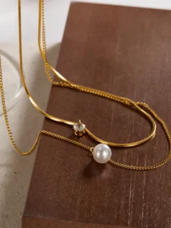 Collier superposé en perles de colle et zircone cubique pour femme 2026