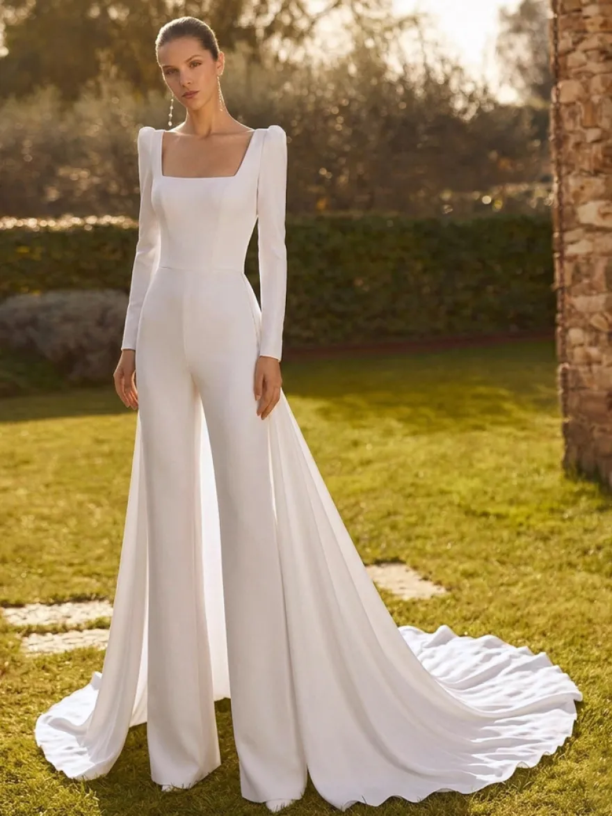Combinaison de mariée 2 pièces en crêpe stretch avec nœuds et traîne col carré manches longues taille naturelle couleur ivoire